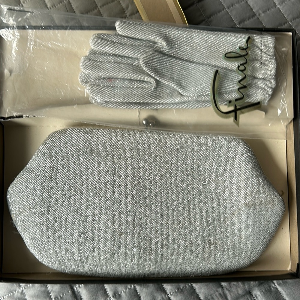 Circa 1950s vintage clutch purse with matching gloves.